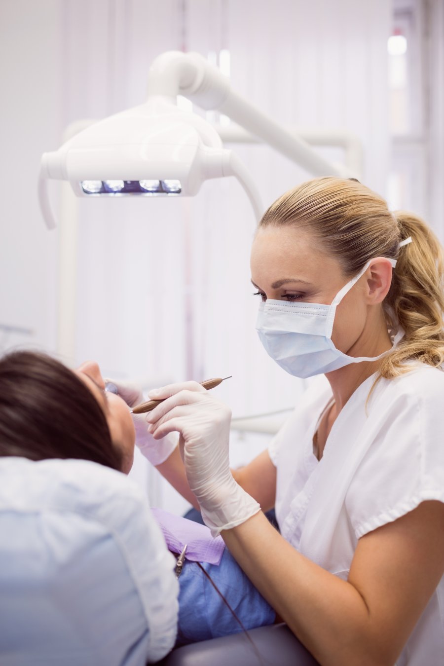 dentist examining female patient (1)